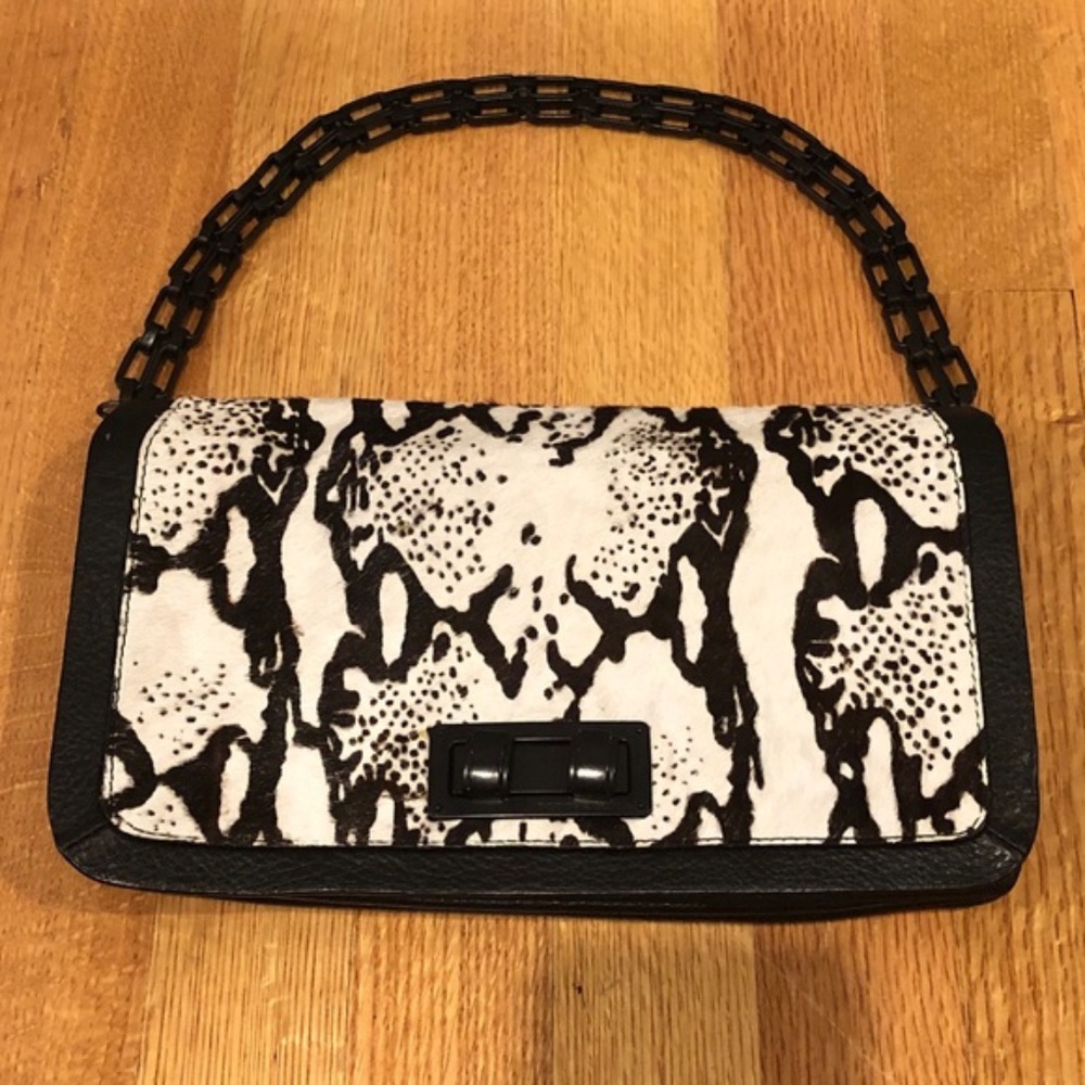 BCBGMAXAZRIA Sophia Snake Print Animal Hair Clutch